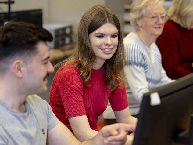 People sitting at computer