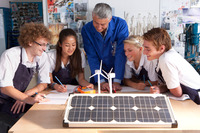 Children learning about solar panels