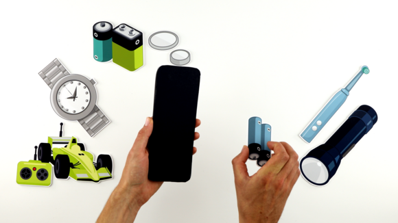 Batteries being removed from a remote