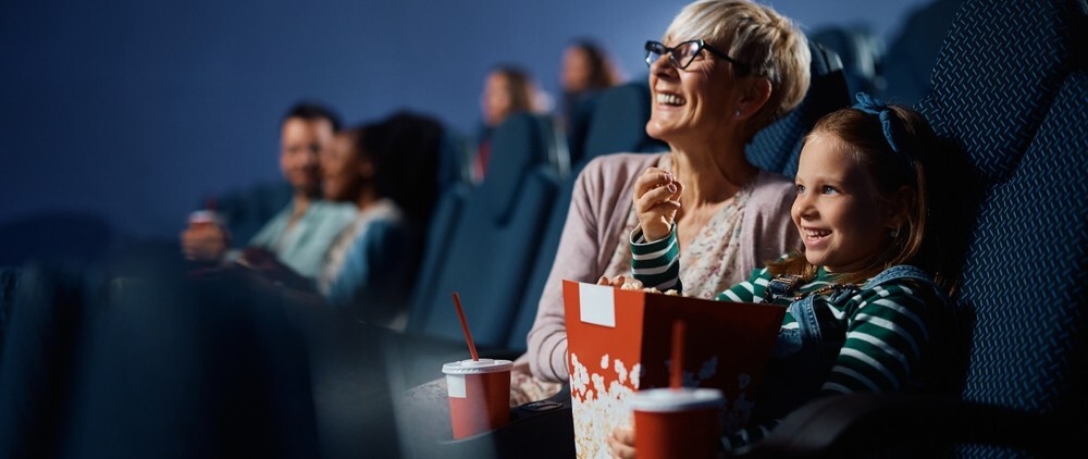 woman and girl in cinema