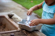 Child playing with mud