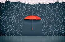 Umbrella with rain falling on it