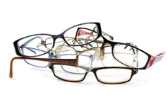 Old spectacles piled on top of each other