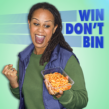 Black woman holding a tub of spaghetti. 