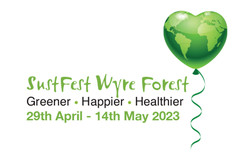 Susfest logo which includes a green heart shaped balloon