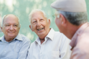 three older men having a laugh