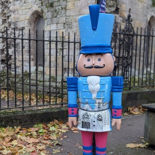 nutcracker sculpture in library square