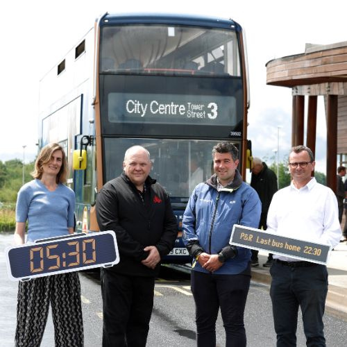 Image of Cllrs and First bus representatives by buses