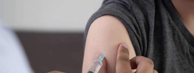 Image of a person getting an injection