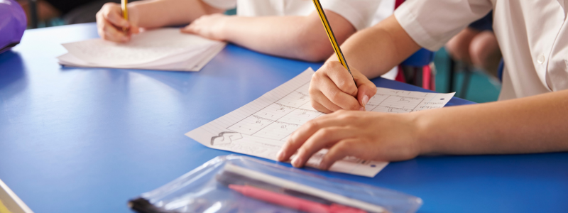 Young people doing school work