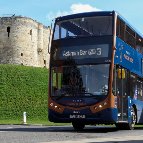 Bus in York with Clifford's Tower