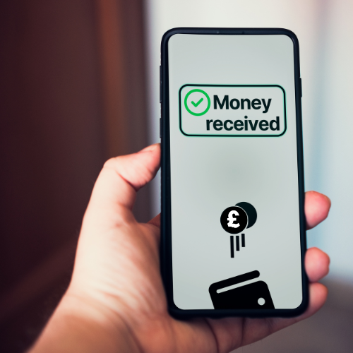 A phone saying 'Money Received'