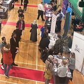 People in a hall at a jobs fair