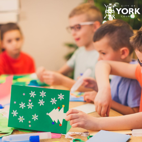 Children making Christmas cards
