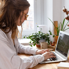 Woman works on a laptop
