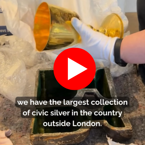A screenshot showing someone picking up a gold cup