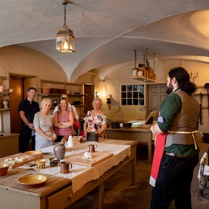 A cookery demonstration in our historic kitchen