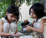 Girls pouring water