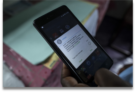 phone-showing-mHero-app
