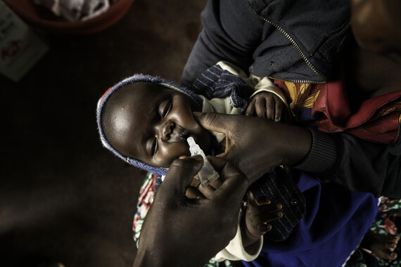 Newborn receiving vaccine