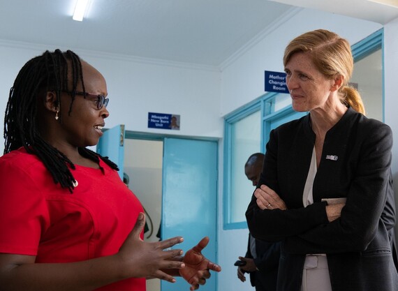 Administrator Power speaking with a health worker in Kenya