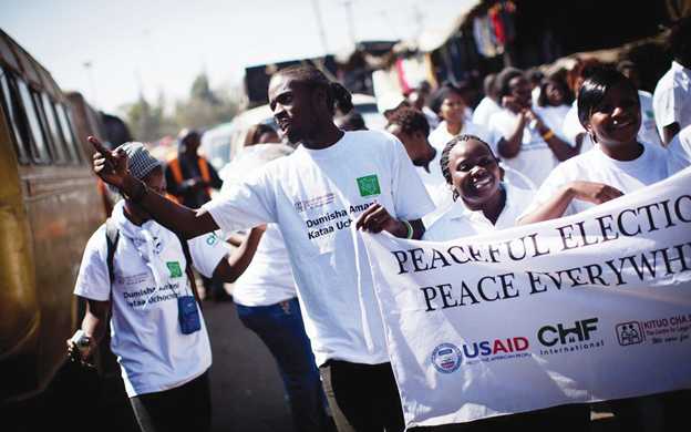 A group of Kenyan youth march for peace before the general elections in March 2013. (Photo: USAID/Kenya)