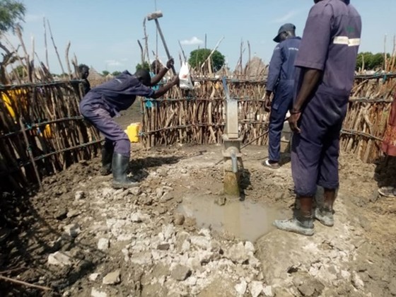 Workers rehabilitating the Gerguer Borehole in Bilkey Payam, Akobo County. Photo: Afia Water, Sanitation, and Hygiene Activity