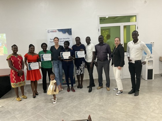 PLSO interns (holding certificates) graduate after training photo PLSO South Sudan