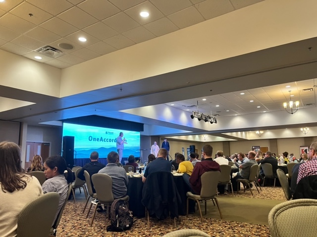 A photo of the ballroom and main stage at the OneAccord Conference