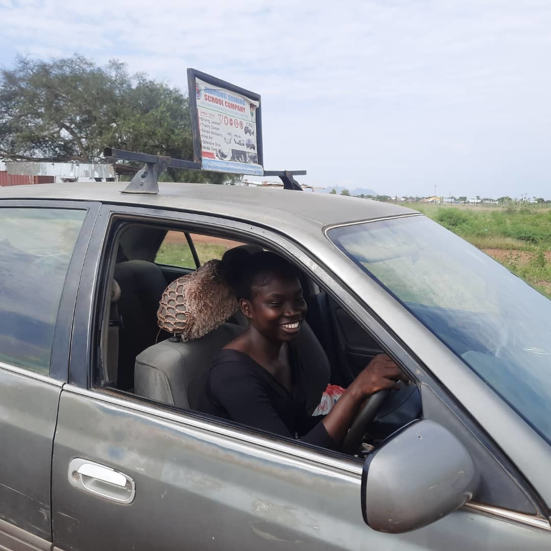 Charity is pursuing her goal of becoming a professional driver, a male-dominated field in South Sudan. Photo: Jhpiego