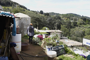 Guadalupe completes daily tasks with water from a SPA-support cistern