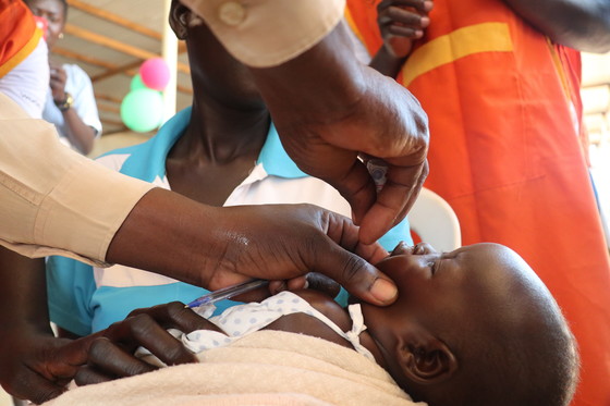 Child being vaccinated in Yei during World Polio Day Commemoration