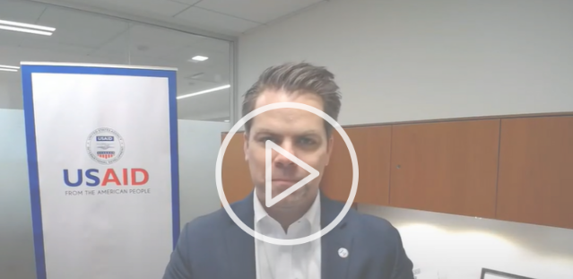 Director Phillips speaking directly to camera 