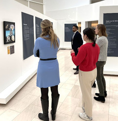 The FBNP team walks through exhibit at the U.S. Institute of Peace 
