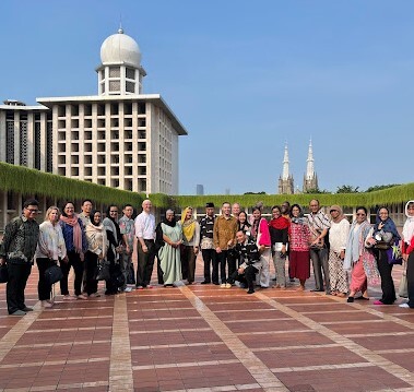 Training participants pose for photo outside the Grand Istiqlal Mosque.