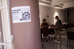 Family therapist waits to meet with clients at a church in San Miguel, Tegucigalpa.