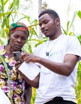 A Pula client discusses coverage with an agent.