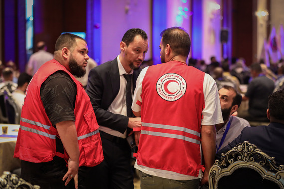 Disaster management summit attendees participate in a table top exercise. 