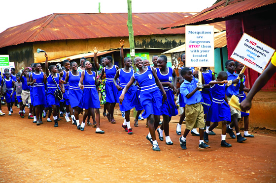 School Children in Ghana march against malaria. Photo credit: Sarah Hoibak, VectorWorks. Courtesy of Photoshare.