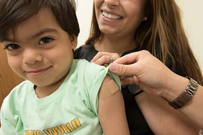 boy with a Band-Aid on his arm