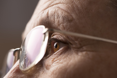 closeup of person's eyes and eyeglasses