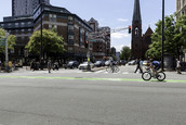 Crosswalk With Cyclists and Cars