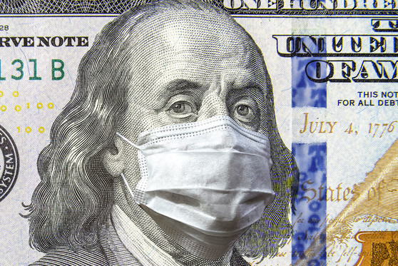 Image of Ben Franklin from a $100 bill wearing a face mask