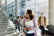 A female college student walks to class.