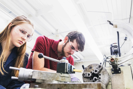 Engineering students working at a science lab