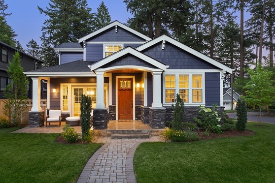 The exterior of a house at twilight