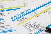 A close-up image of retirement plan papers