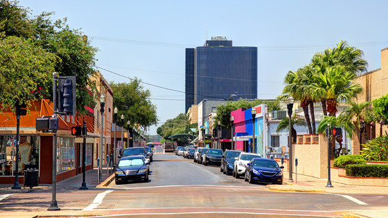 A main street with shops in a coastal town