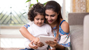 Mother and daughter with tablet