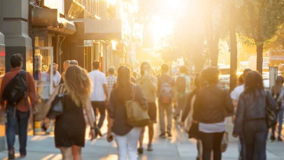 People walking at dusk